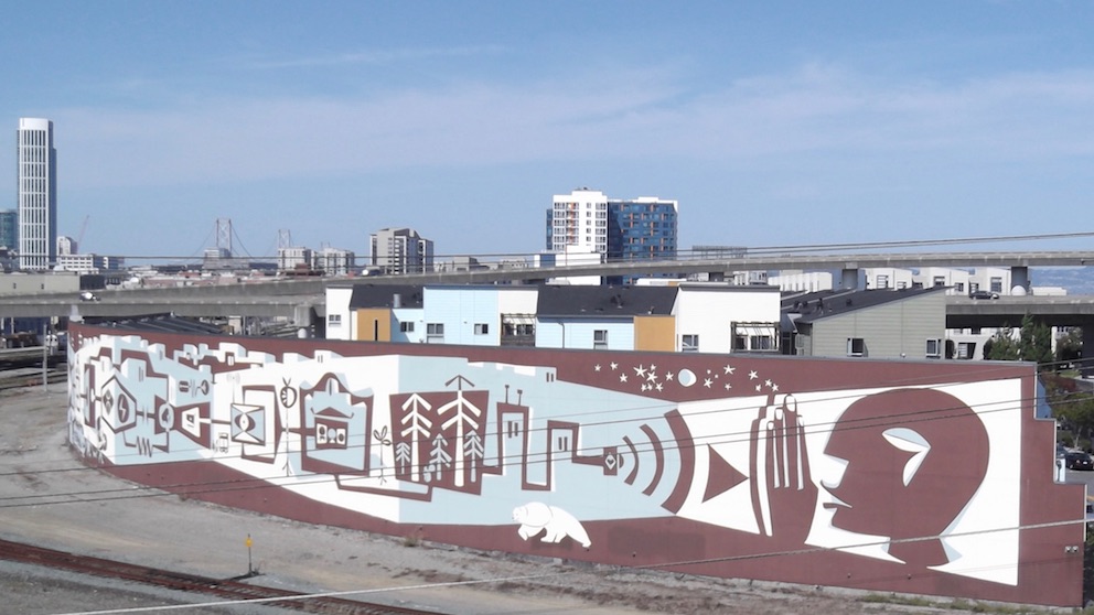 A mural alongside the Caltrain tracks